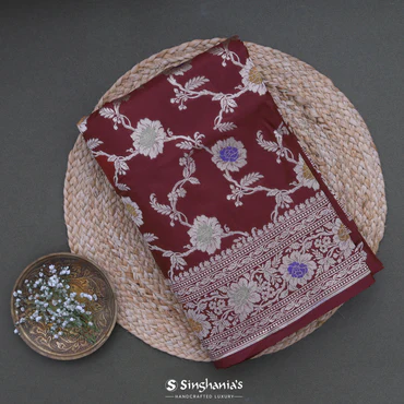 a maroom colour banarasi saree with zari border jaaldar motif