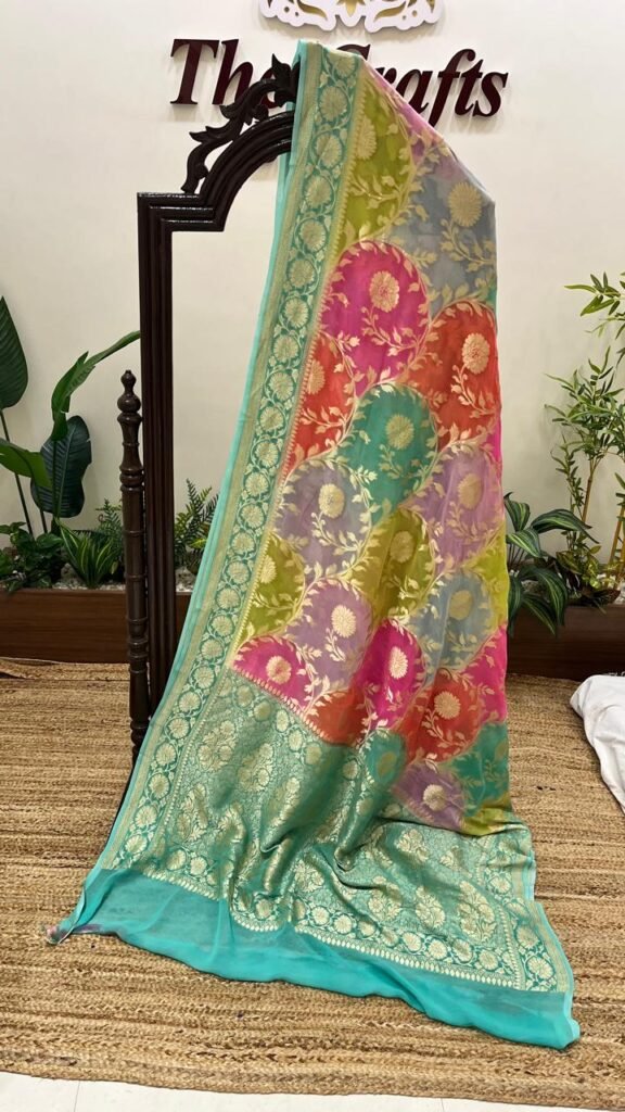 blue multi colour georgette saree with zari border and pallu motif blue multi colour georgette saree with zari border and pallu motif