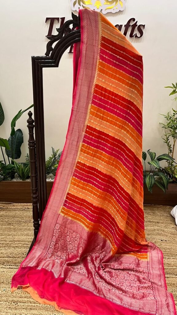 red gold stripe georgette saree with zari border and pallu motif red gold stripe georgette saree with zari border and pallu motif